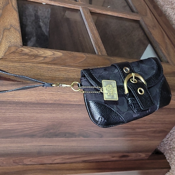 - Coach wristlet black super cute large enough for phone. - Picture 5 of 16